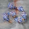 12 Packs: 6 ct. (72 total) Blue Lampwork Glass Bumpy Round Beads by Bead Landing™